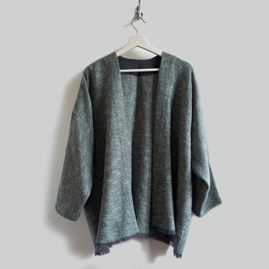 grey aqua sleeved cardigan with grey background