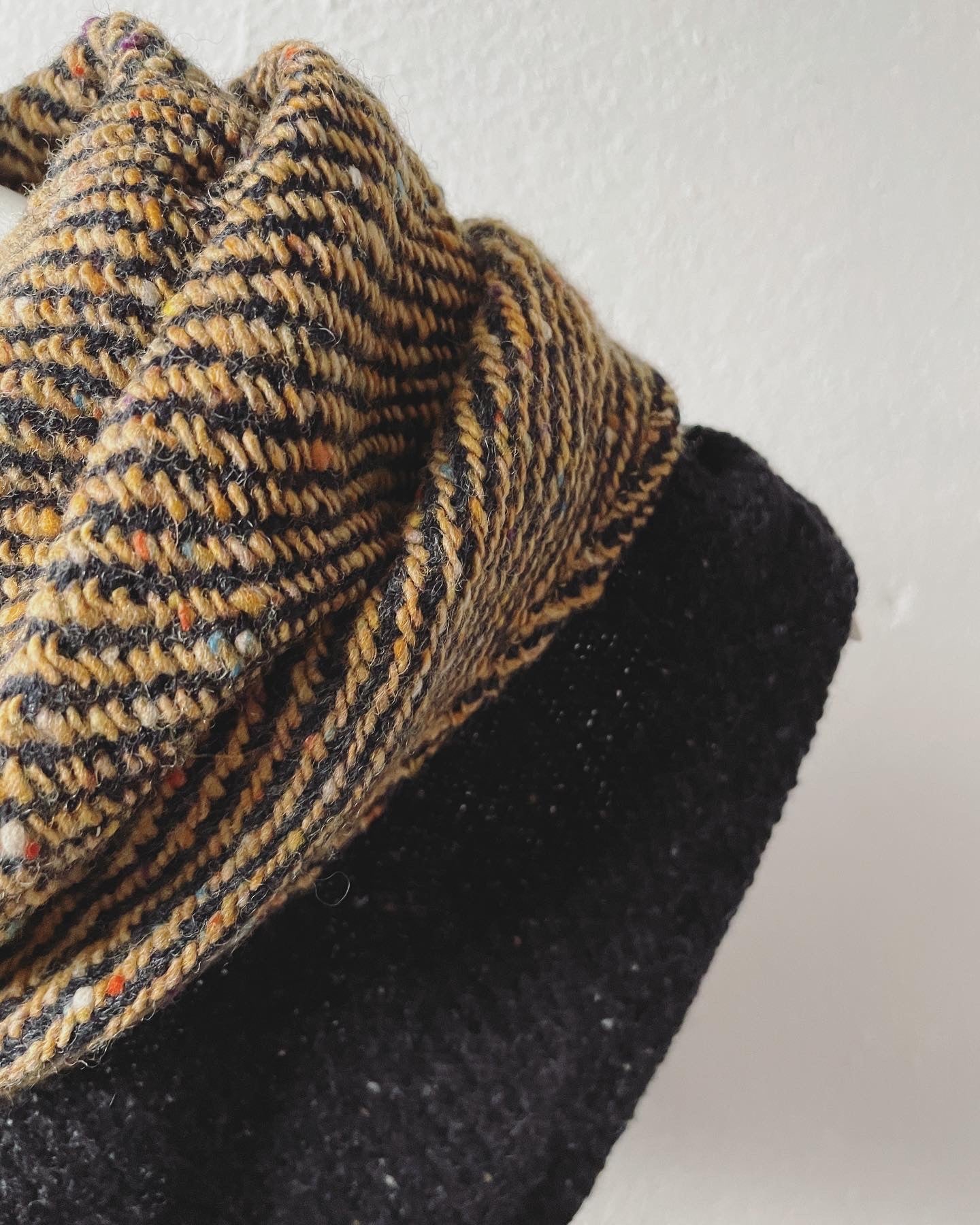 detail of weave gold and black fleck